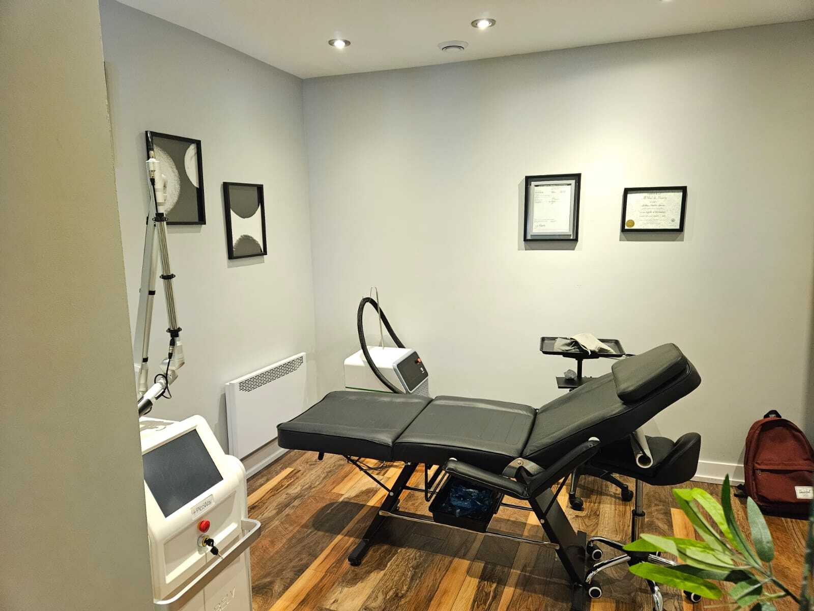 A private treatment room at Rico Clinic in Montreal set up for laser tattoo removal